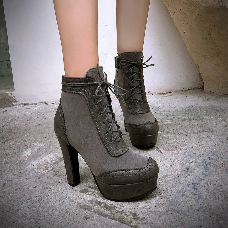 Women's ultra-high heel round toe low-cut Martin boots in solid colour with side zipper, available in black brown gray yellow