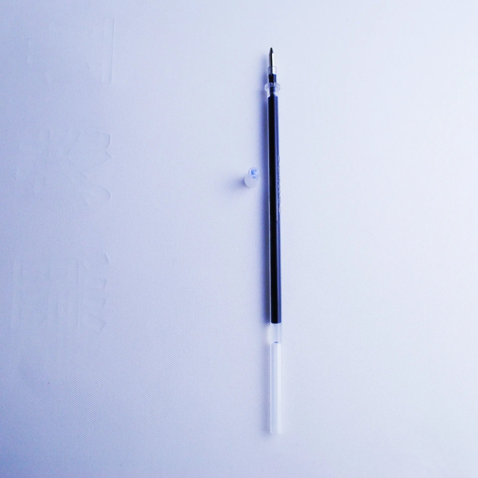 Automatic fading ink pen set with 8 blue refills, pen holder, and 0.5mm tip