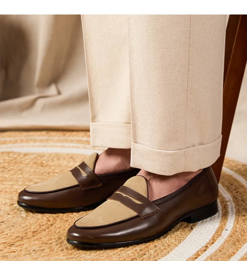 Coffee grey suede Belgian loafers with a slip-on design and rubber sole.