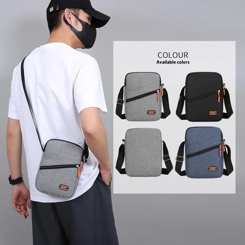 Lightweight Oxford cloth crossbody commuter bag in a solid colour with contrast detailing.