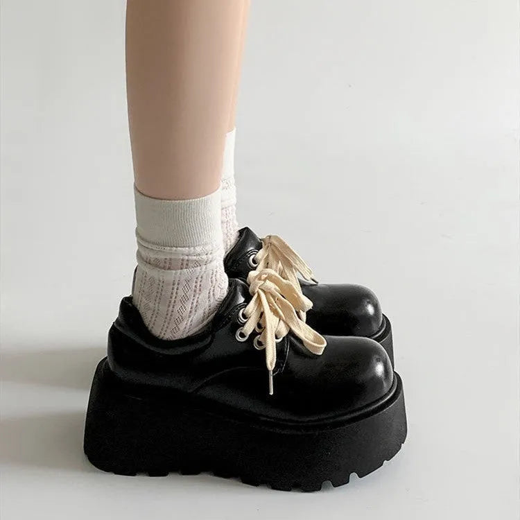 Matte black women's lace-up shoes with a chunky 6-8cm platform heel and round toe.