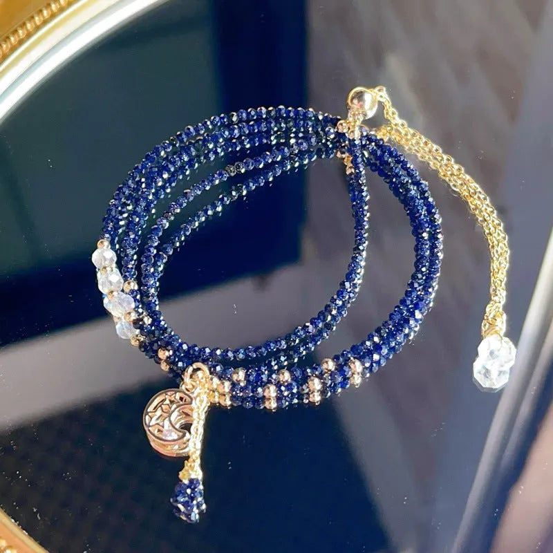 Blue sand stone three-ring bracelet with gold accents and adjustable closure