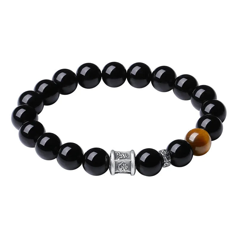 Men's black obsidian mantra bracelet with 10mm prayer wheel beads and silver connections