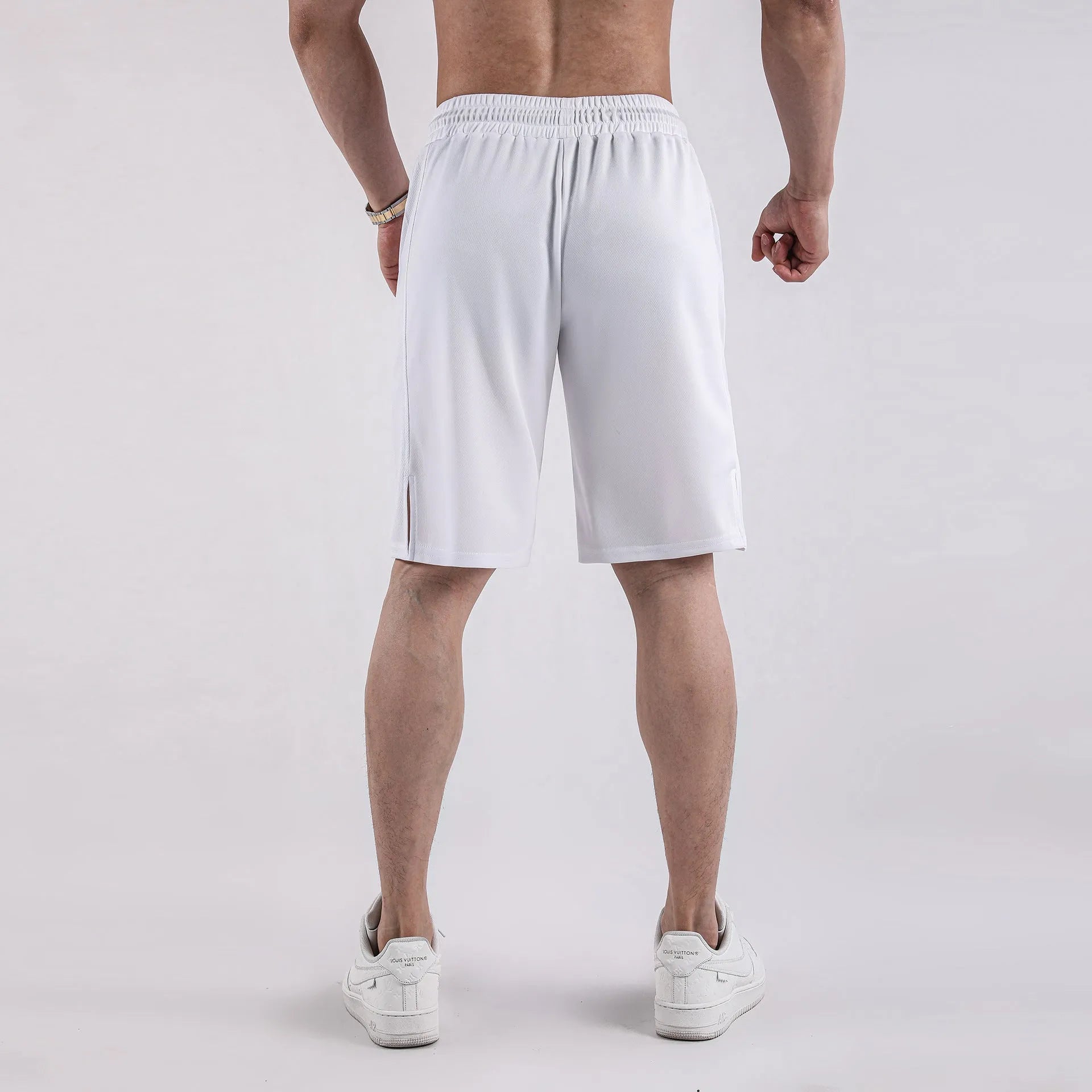 Men's black quick-drying mesh shorts with elastic waist and loose casual fit