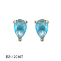 Gold-plated pear drop earrings in a candy colour with zircon stone accents on a simple copper setting.