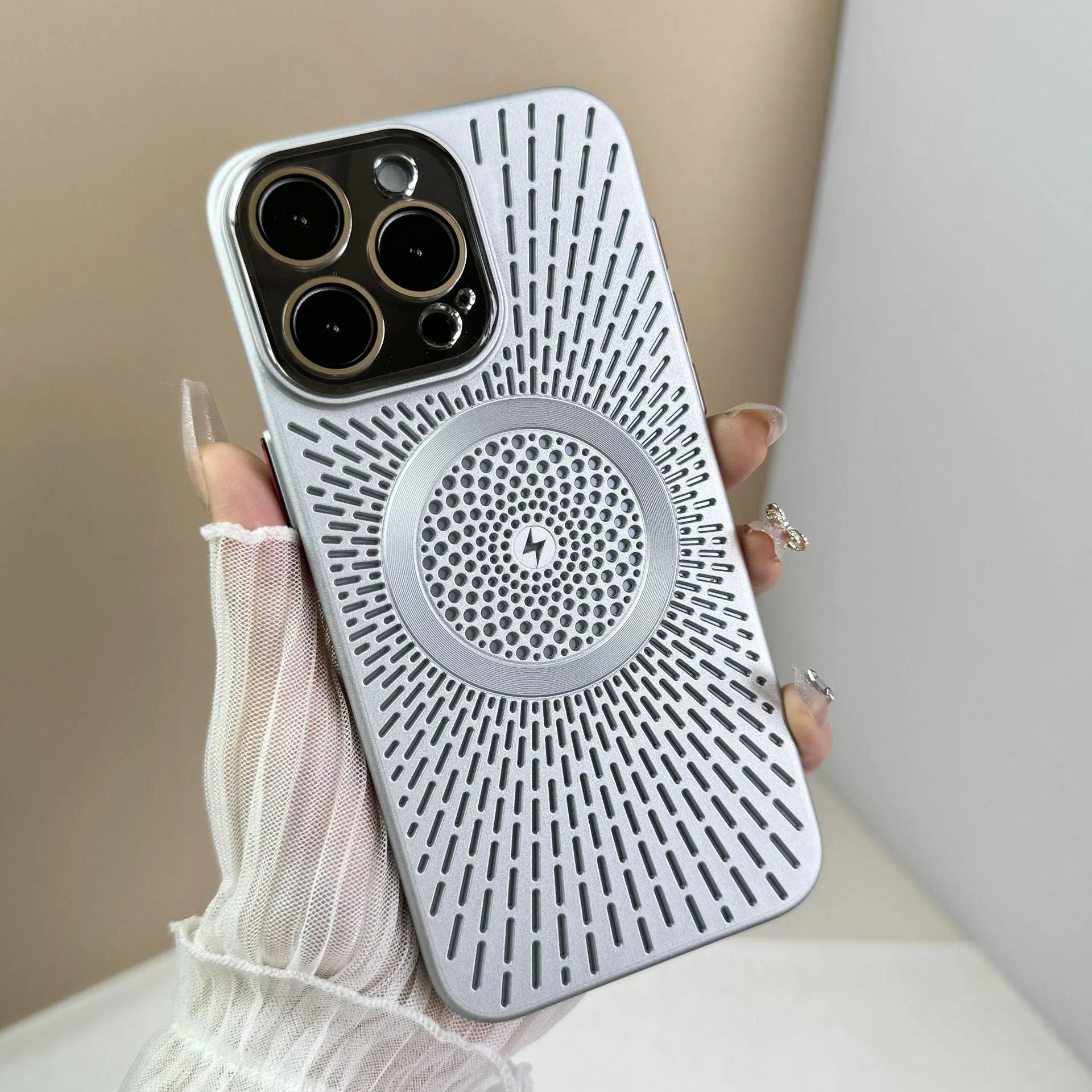 Hollow PC phone case with heat dissipation network and magnetic charging for iPhone, in platinum silver