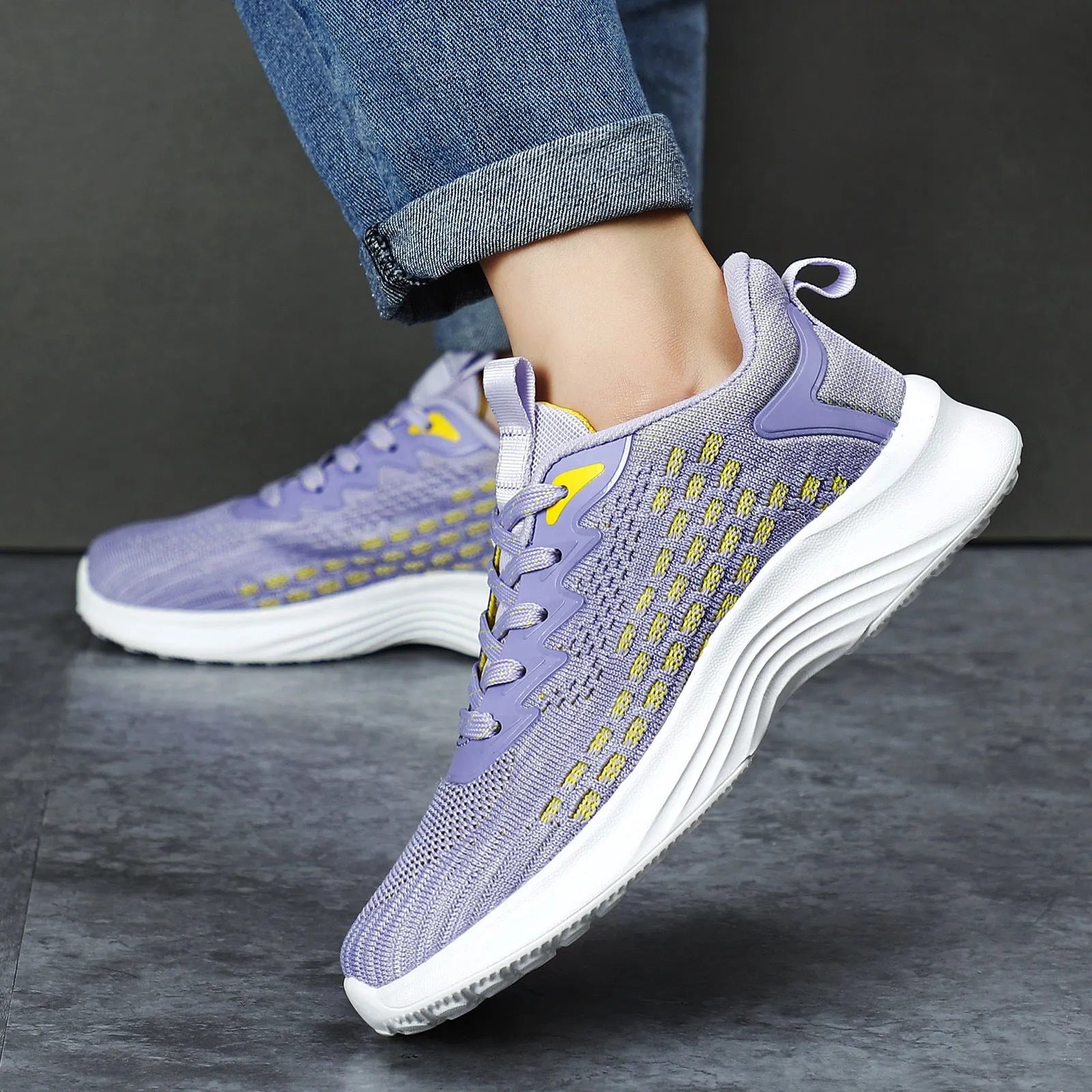 Women's Lavender Purple Flyknit running shoes with striped pattern, mesh upper, and flat EVA sole.