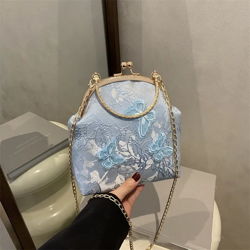 Women's fabric embroidered chain retro messenger bag in bucket shape, soft material, single shoulder strap, colour black