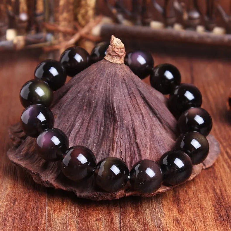 Polished crystal Pi Xiu bracelet with ice stone beads on wrist