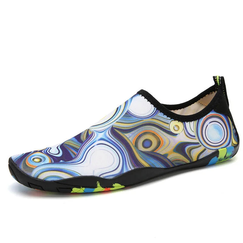 A pair of quick-dry beach wading shoes in camouflage print, showing the Lycra elastic upper and EVA midsole.