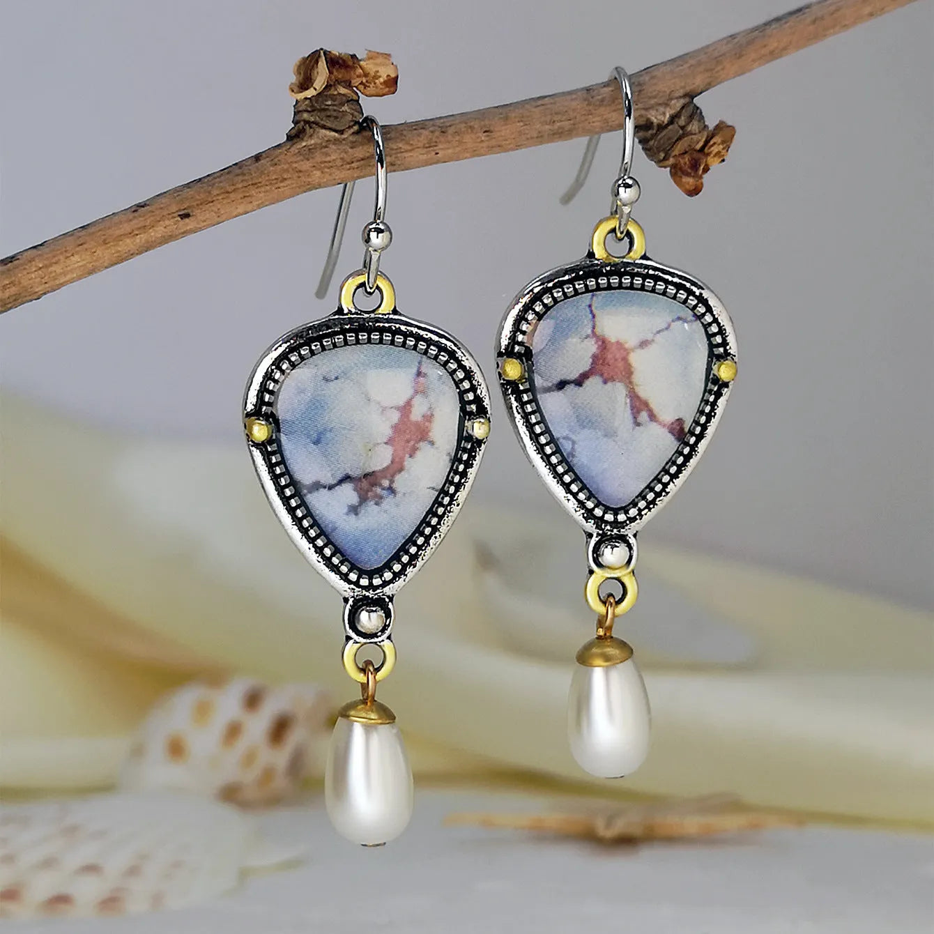 Retro blue drop earrings with synthetic opal, white pearls, and geometric bohemian design