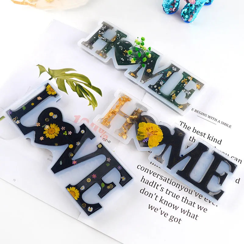Six silicone epoxy moulds with English letter designs including love, home, family, Live, hello, and Blessed