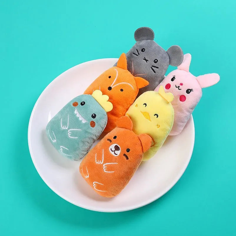 Four catnip plush toys with squeakers for chewing and interactive play