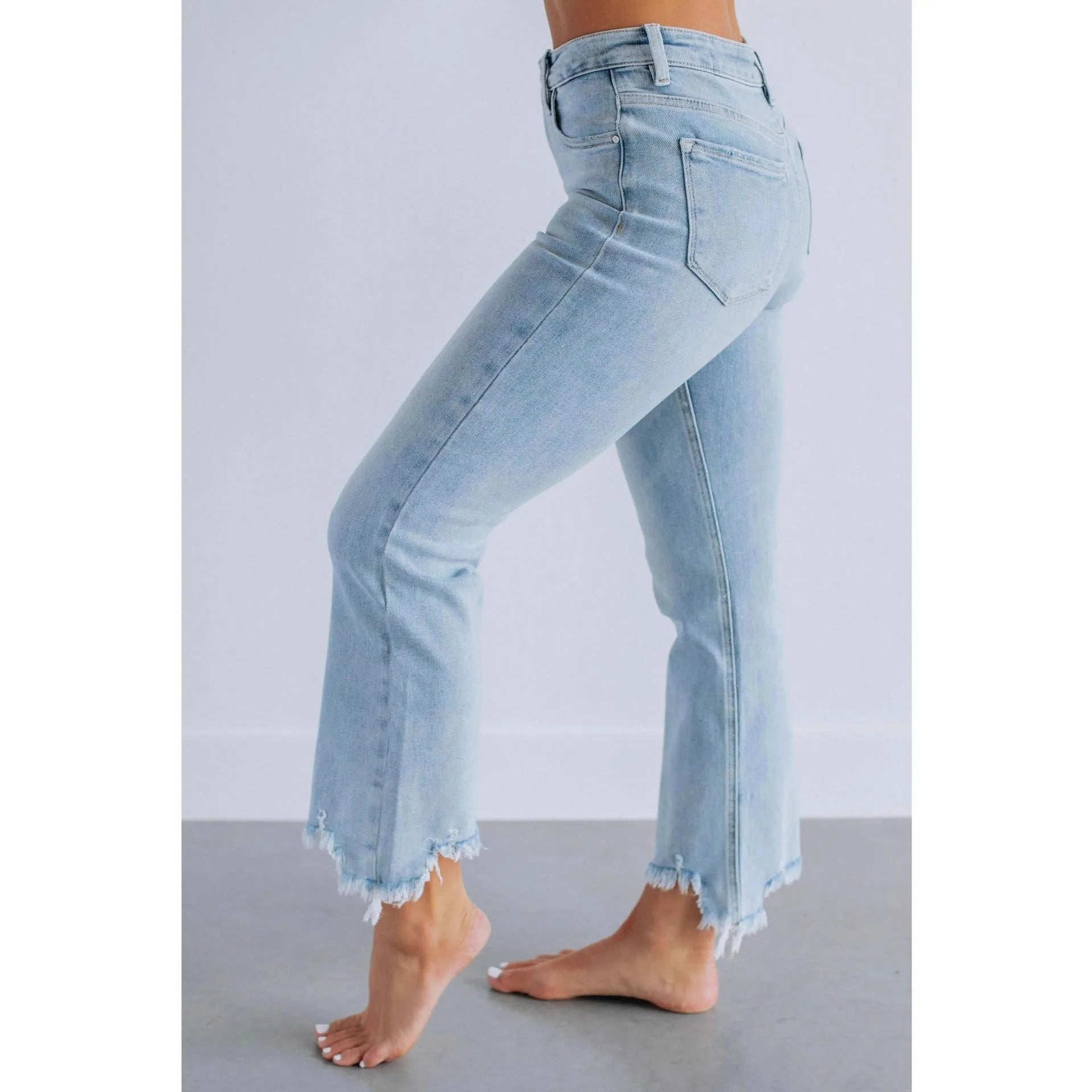 Women's casual denim trousers in dark blue or light blue with hand-worn detailing and five-pocket design