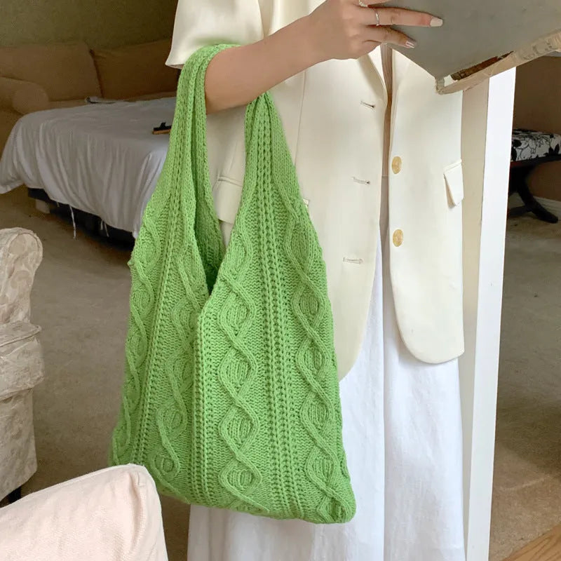 Large retro hollow knitted woolen tote bag with double shoulder straps in a solid colour.