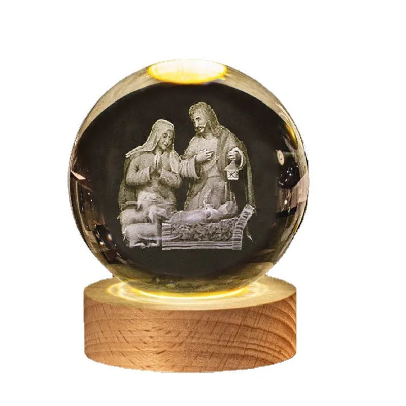 Clear white 6cm crystal ball desk ornament on wooden LED base showing Christian symbol insert