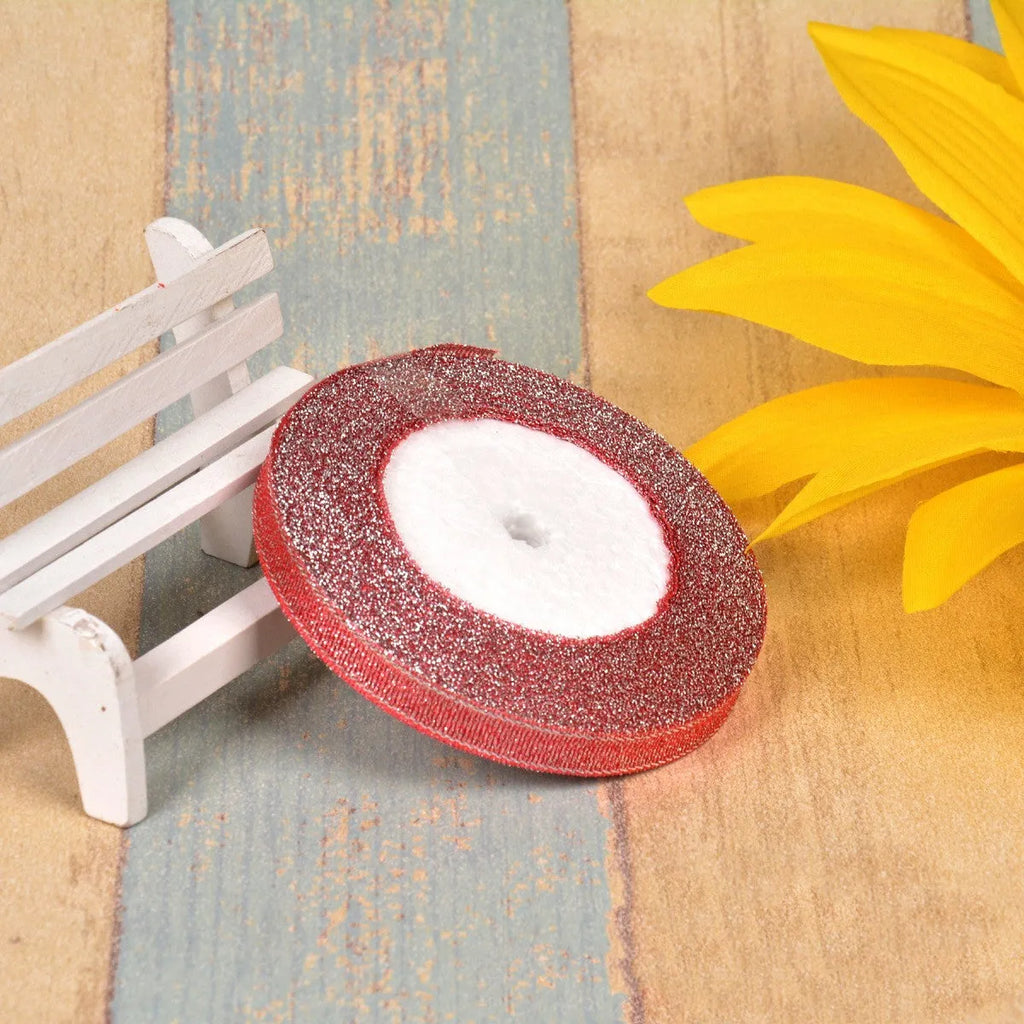 Polyester ribbon roll in green onion colour with gold wire trim showing 3-point width