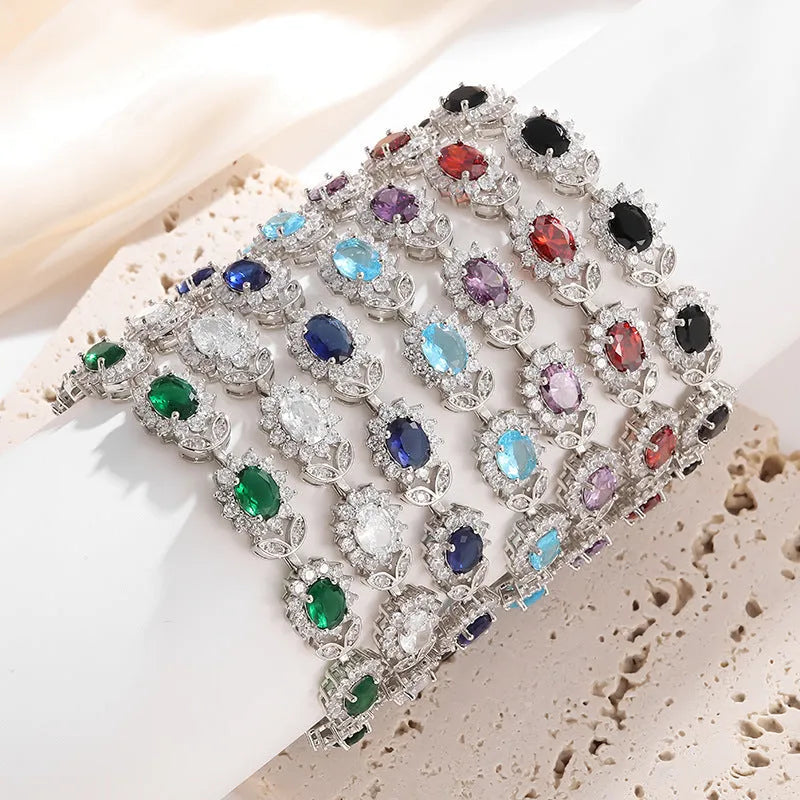 Women's simple zircon inlay bracelet in environmentally friendly alloy, shown in various gemstone-inspired colour finishes.