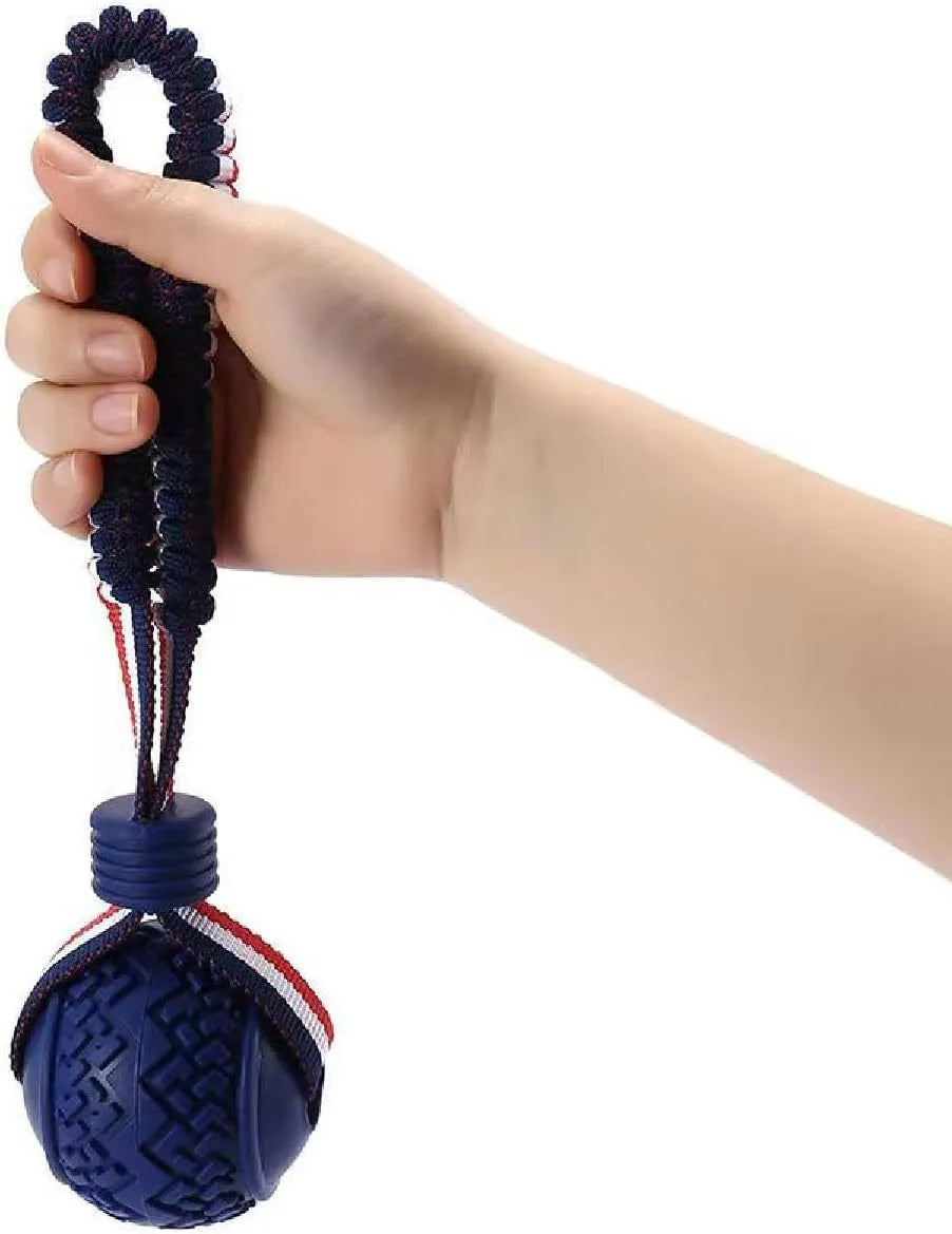 Blue natural rubber dog ball with rope attached measuring 6.5cm diameter