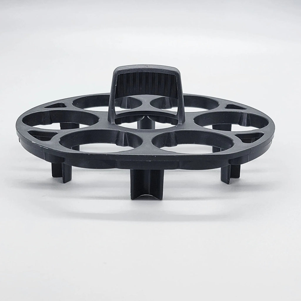 Black plastic egg holder measuring 13.8cm with retainer function for cooking machine storage