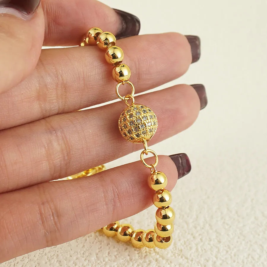 Women's copper bracelet with single zircon ball in heart-shaped Arabic style design
