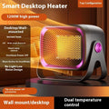 White ceramic desktop electric heater with rotatable base and push-button controls.