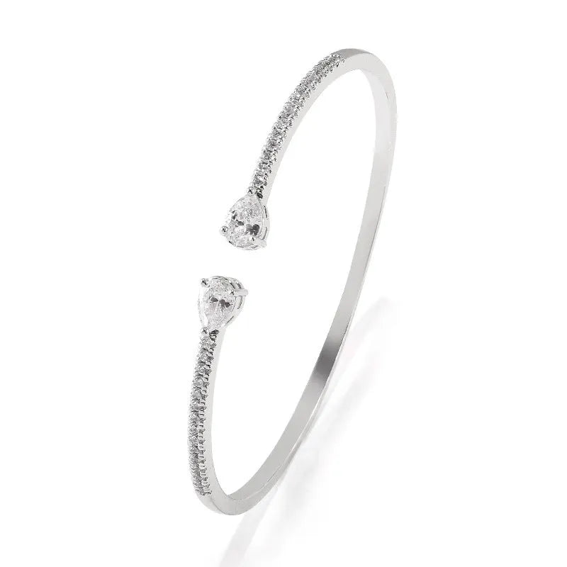 Multi-zircon personalised bracelet with inlaid detailing on copper in blue and white options