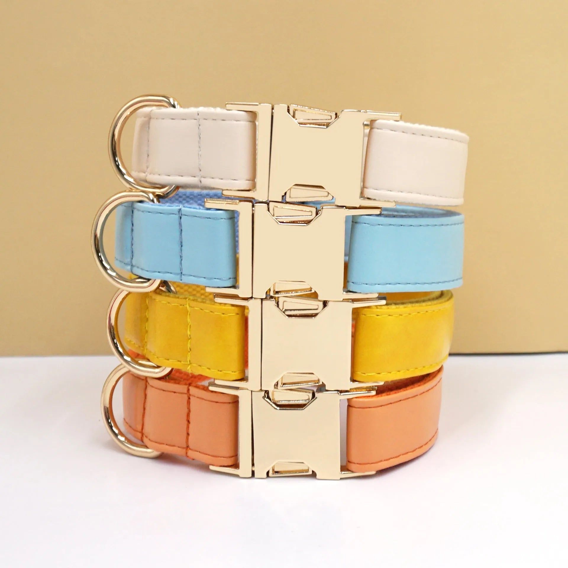 Leather dog collar with velvet colour block in caramel, showing metal buckle and D-ring
