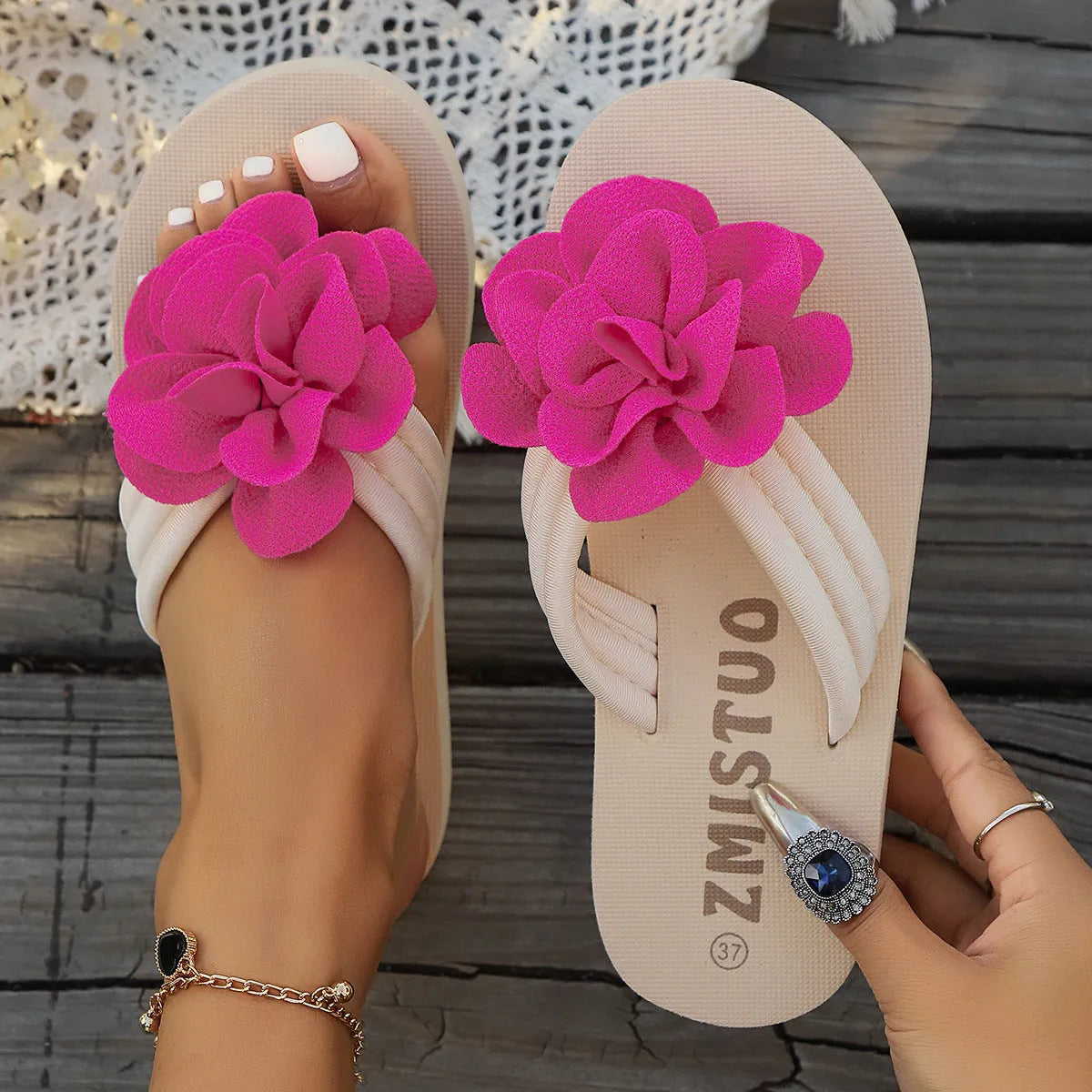 Plus size floral flip flop slippers in beige, green, and rose red on a white background.