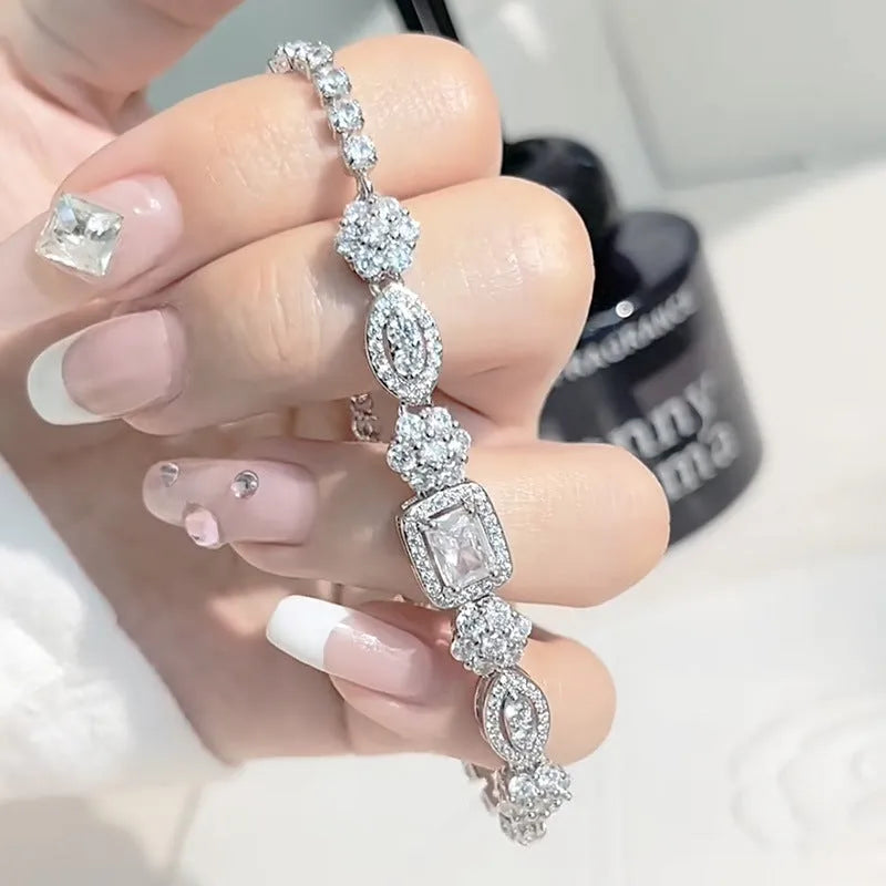 Women's geometric zircon bracelet with silver and white gold plating.