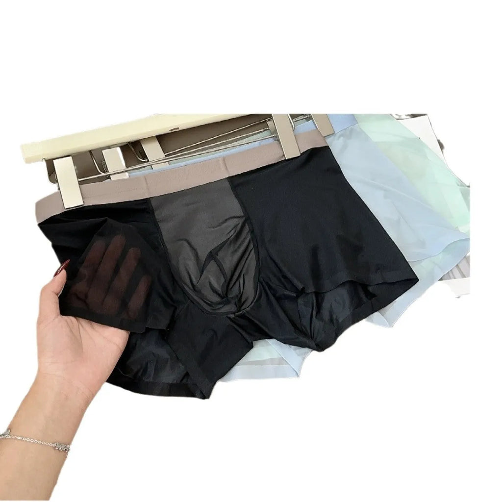 Seamless ice silk men's boxers in a solid colour on a mid-waist mannequin, showing honeycomb crotch detail.