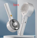 Ceramic white pet grooming brush with spray function and UV sterilisation light for cats and dogs