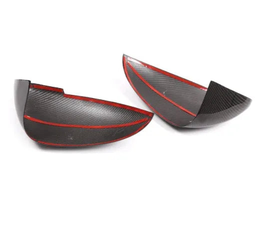 Pair of matte black true carbon fibre rearview mirror covers for a Porsche Macan.