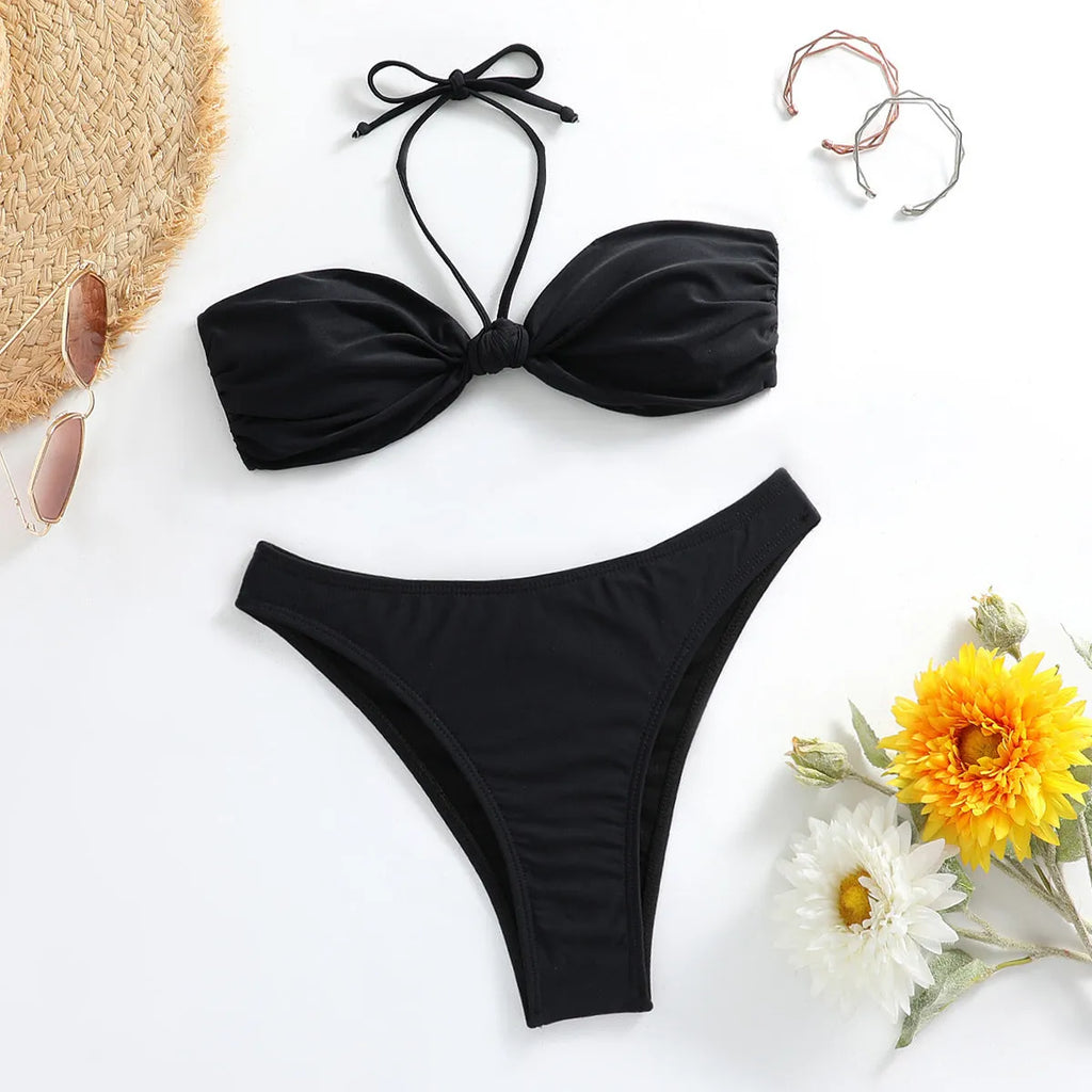 Black women's bikini swimwear set with lace-up tube top and matching briefs
