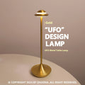 Metallic UFO-shaped desk lamp with touch dimming in black, gold, or grey colour options
