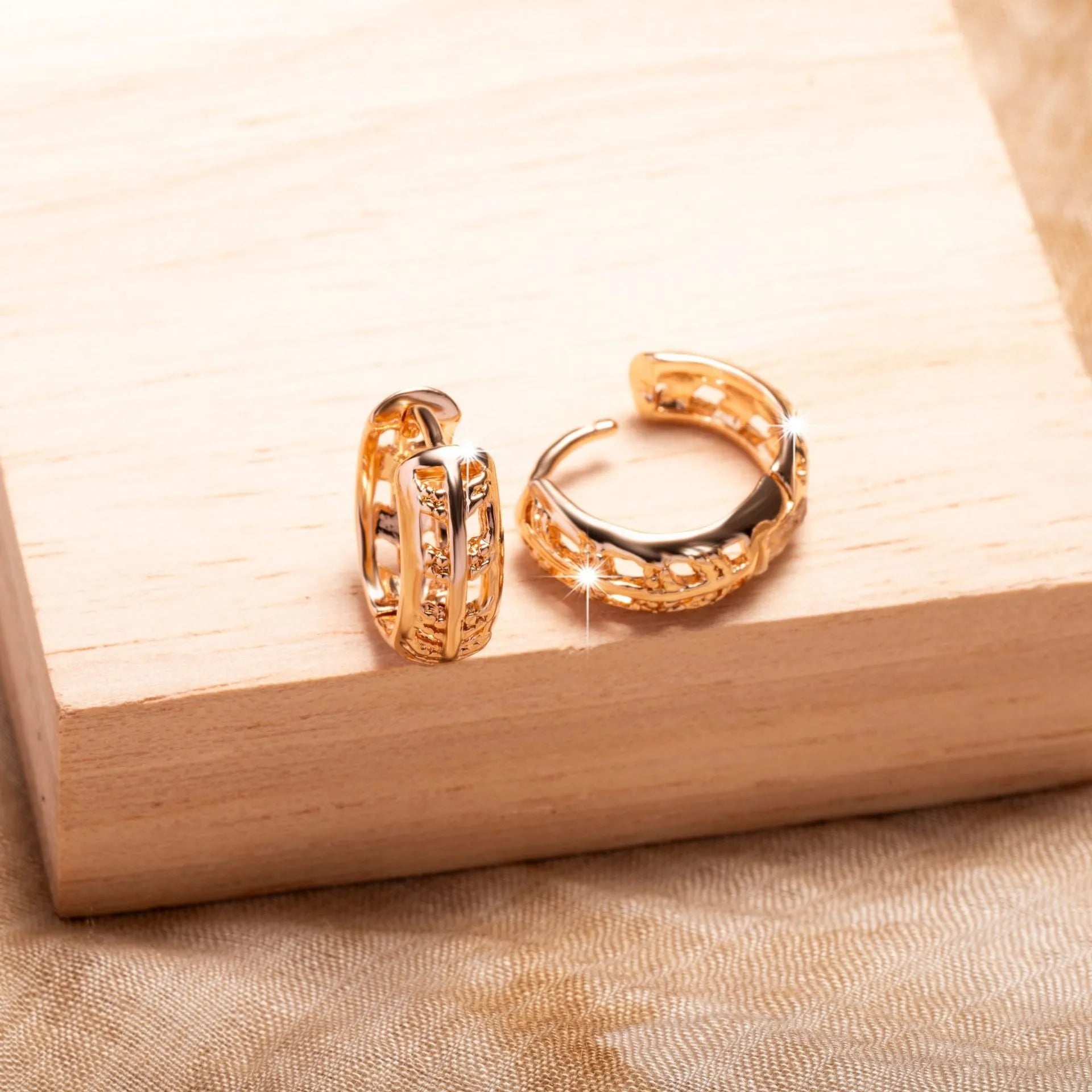 Rose gold leaf-shaped earrings with heart cut-outs, 20mm copper jewellery
