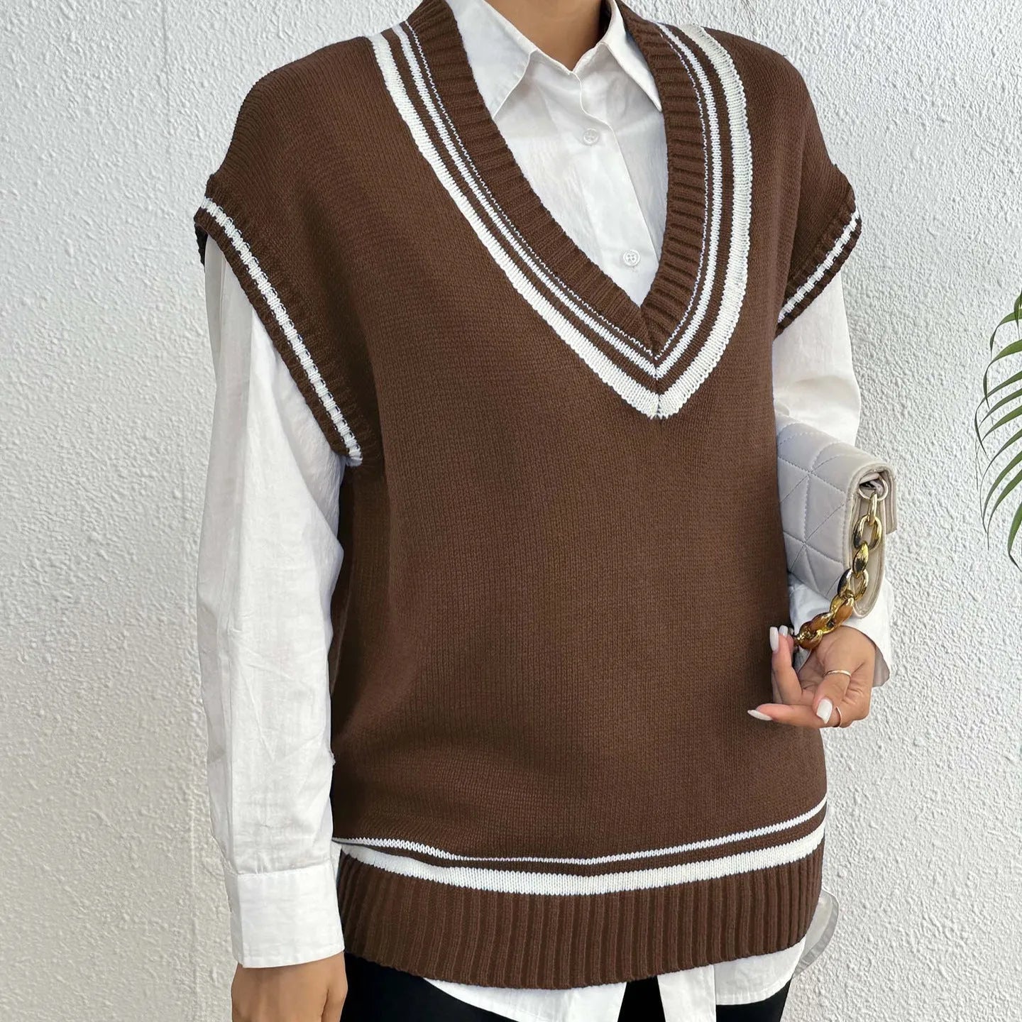 Women's college style wool vest sweater in loose-fitting free size available in blue, coffee and black colours