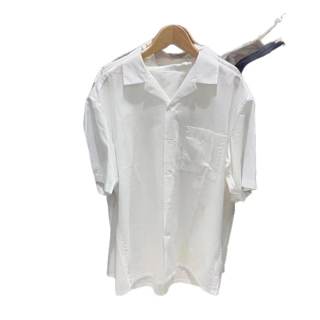 Man wearing a beige open collar casual shirt made from a cotton modal blend with Japanese styling