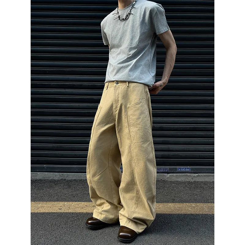 Men's khaki straight leg cotton trousers laid flat, showcasing the casual American retro style.