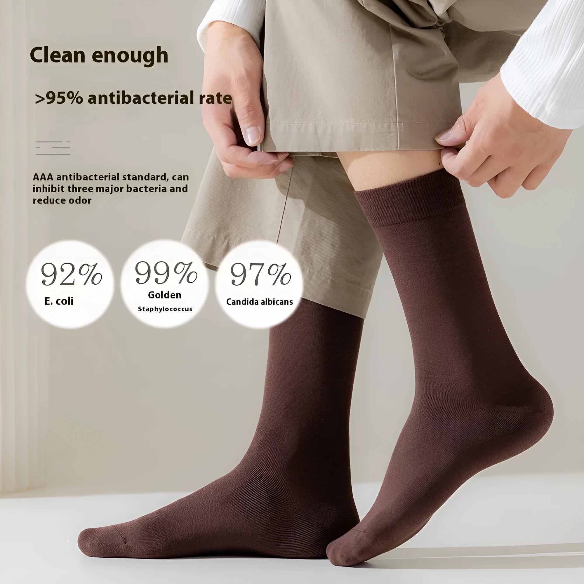 A pair of men's solid colour mid-calf socks made from combed cotton for business wear.