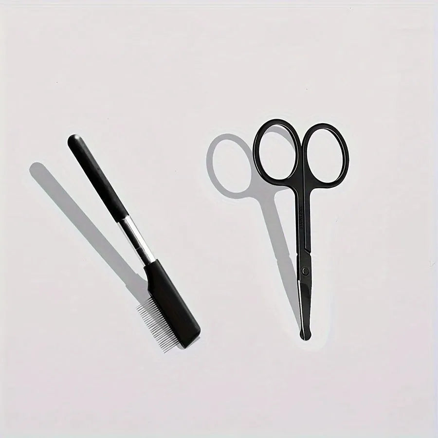 Black pet grooming brush with soft silicone bristles for eye cleaning and comb attachment for hair removal