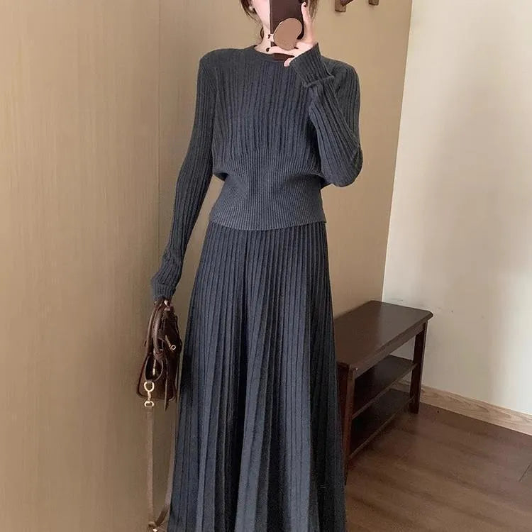 Women's dark grey knitted long dress suit set with 3D pattern, featuring a sweater and skirt in artistic retro style.