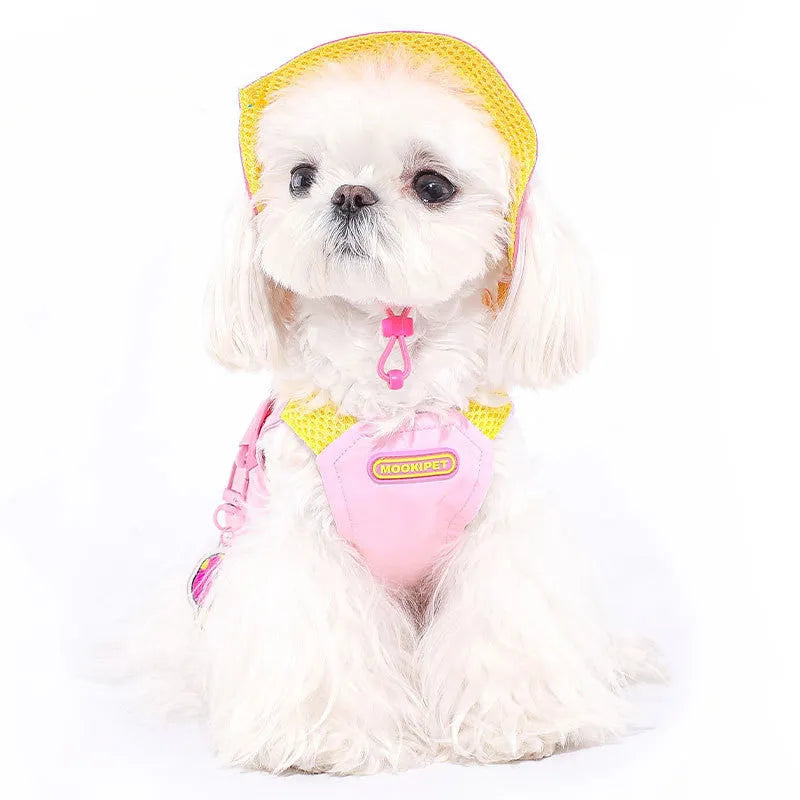 Pink polyester pet vest for small to medium dogs on a Bichon Frise