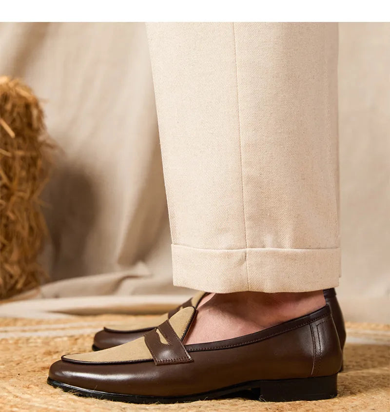 Coffee grey suede Belgian loafers with a slip-on design and rubber sole.
