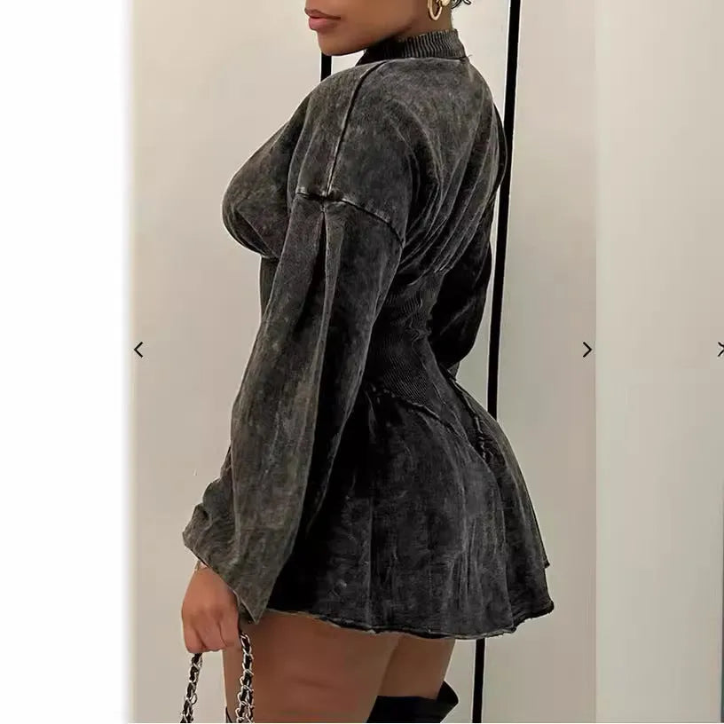 Grey digital printed A-line dress with drawstring waist and long sleeves on a mannequin.
