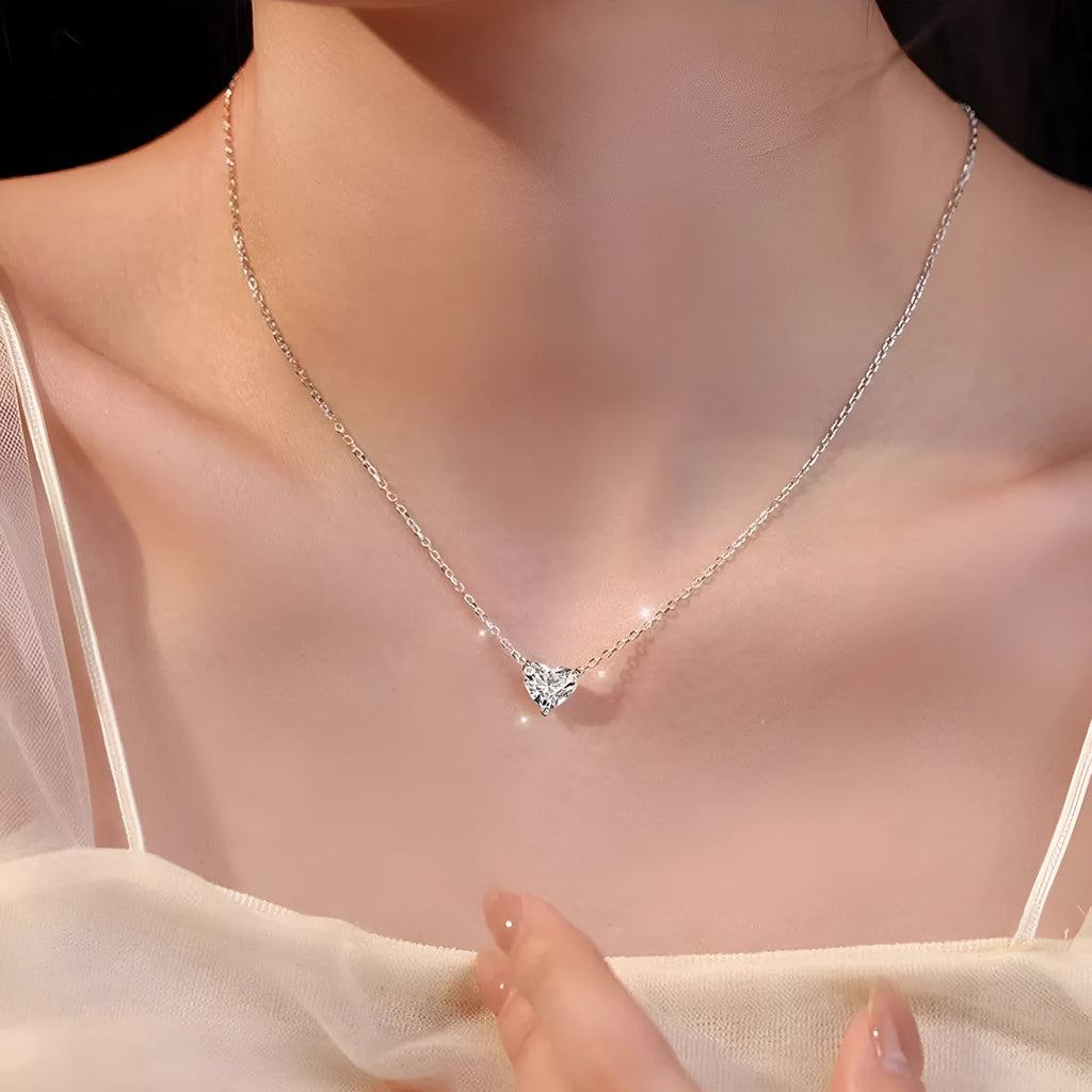 Women's silver colour heart pendant necklace on copper chain, minimalist jewellery design