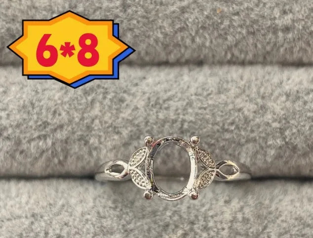 Korean style open mouth copper ring with 6x8mm oval denier stone and star decorations.