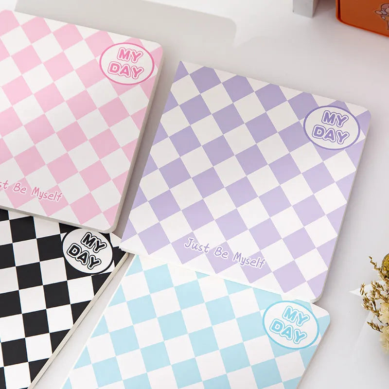 Japanese Korean cute style grid notebook with a colourful embossed fruit design cover, showing 100 sheets inside.