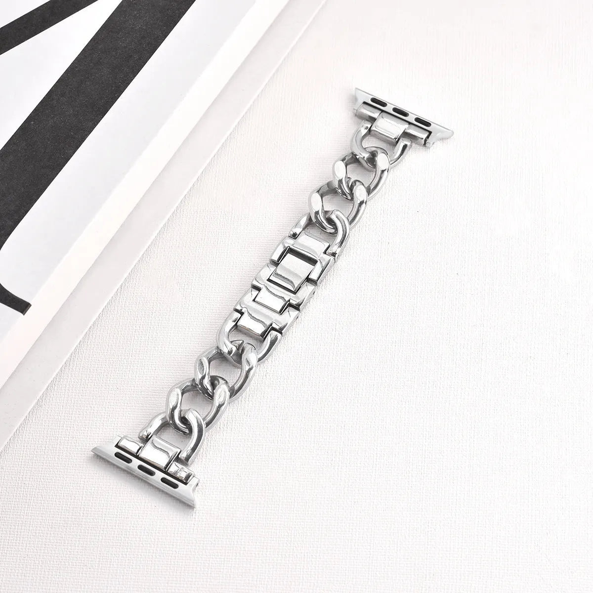 Denim chain design metal Apple Watch strap in multiple colour options showing lug connection
