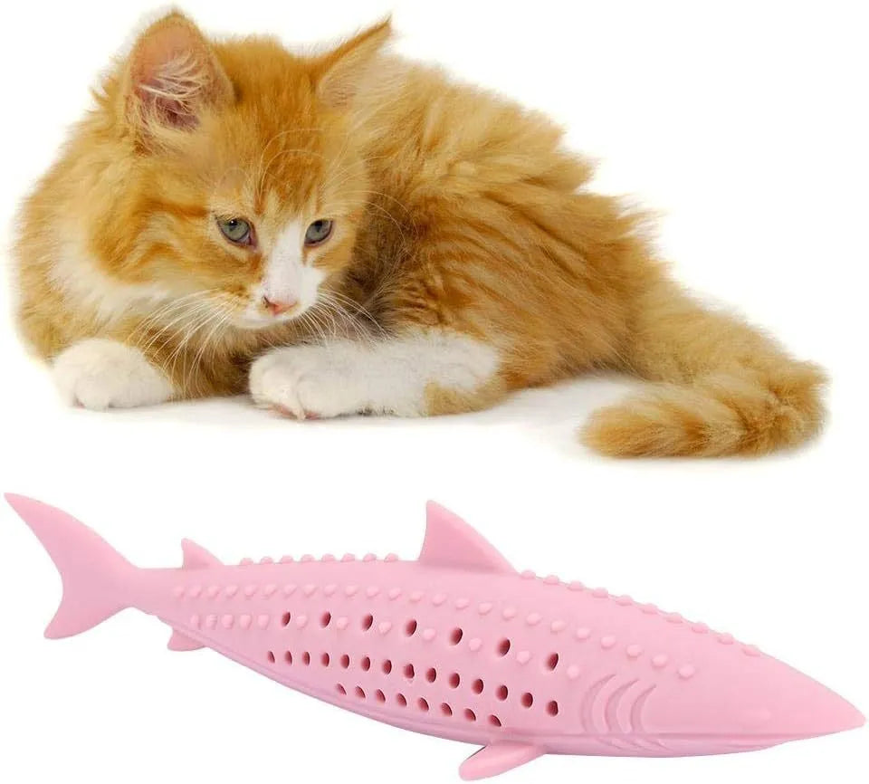 Green silicone fish-shaped chew toy for cats with side holes for catnip scent